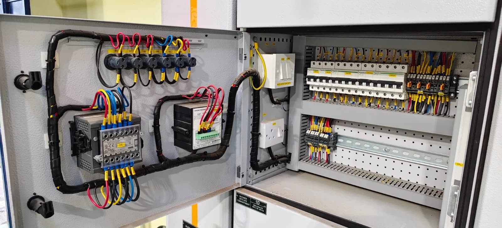 Control panel wiring with routed, labelled and ferruled harnesses built by MGTPL.