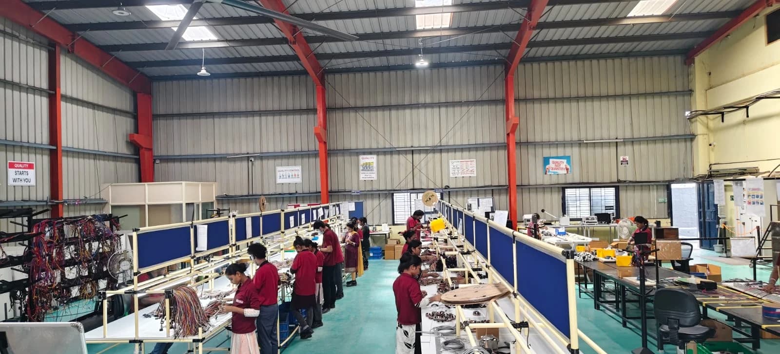 An overview of the MGTPL harness shop floor in Bommasandra, Bengaluru.